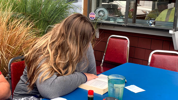 teen reading abook